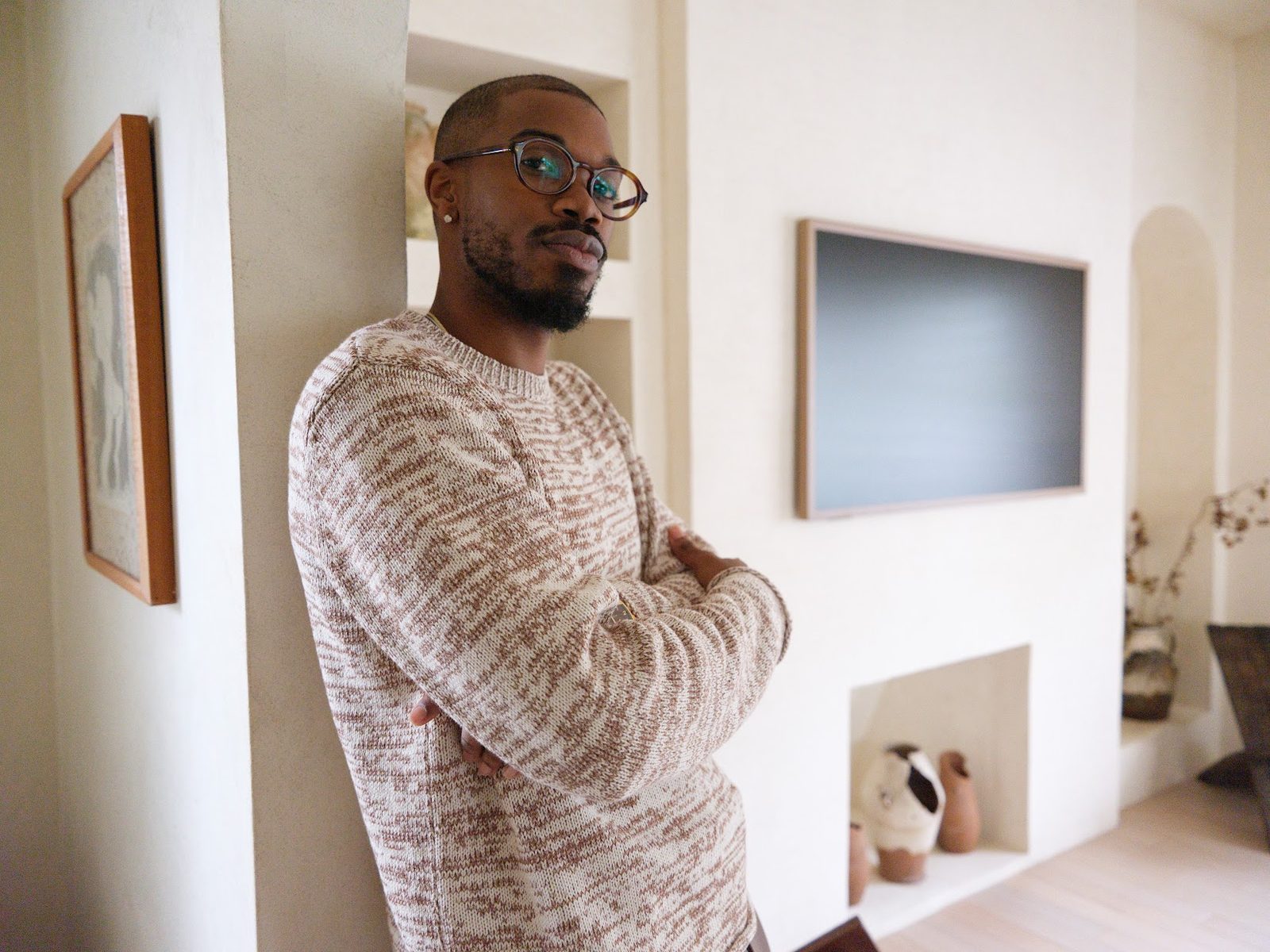 Hart, LMFT in a relaxed candid portrait, dressed in earth tones