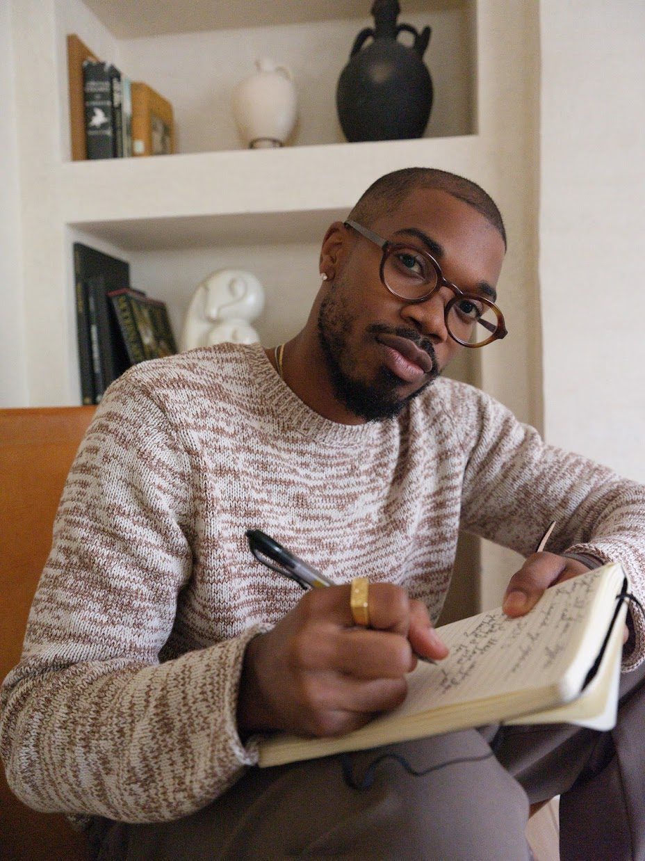 Hart taking notes during a reflective therapy session