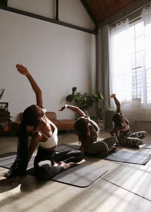 Outdoor wellness coaching session focused on movement and breathwork